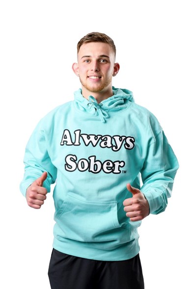 student in a sweatshirt that says Always Sober